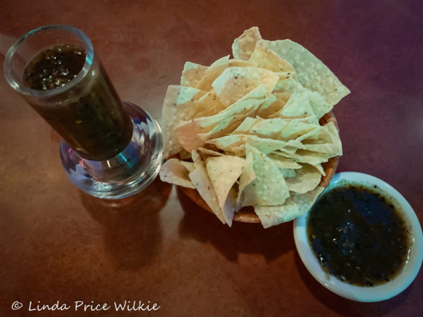 A photo showing Rosario's smokey salsa and tortilla chips.