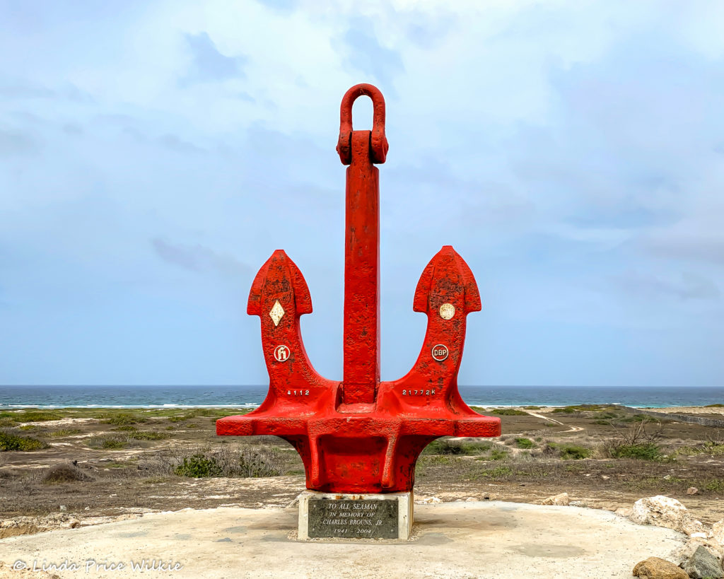 A photo of Aruba's Red Anchor, which is a memorial to seaman in memory of Charles Brouns, Jr. and one of the most photographed locations on the south end of the island.