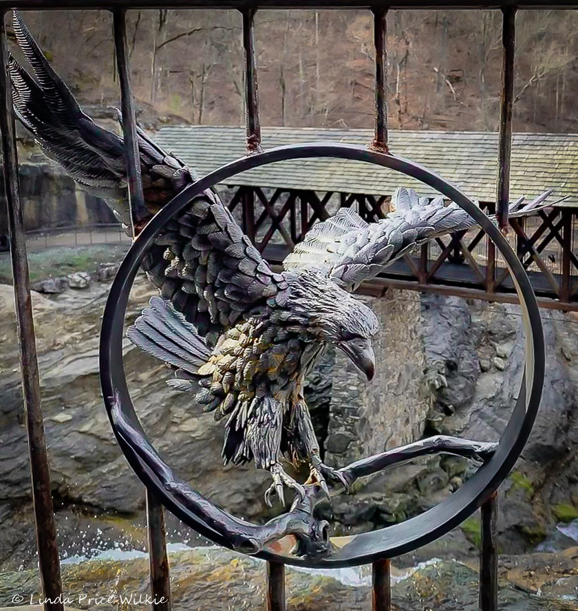 A photo of an eagle sculpture at a lookout point along the trail.